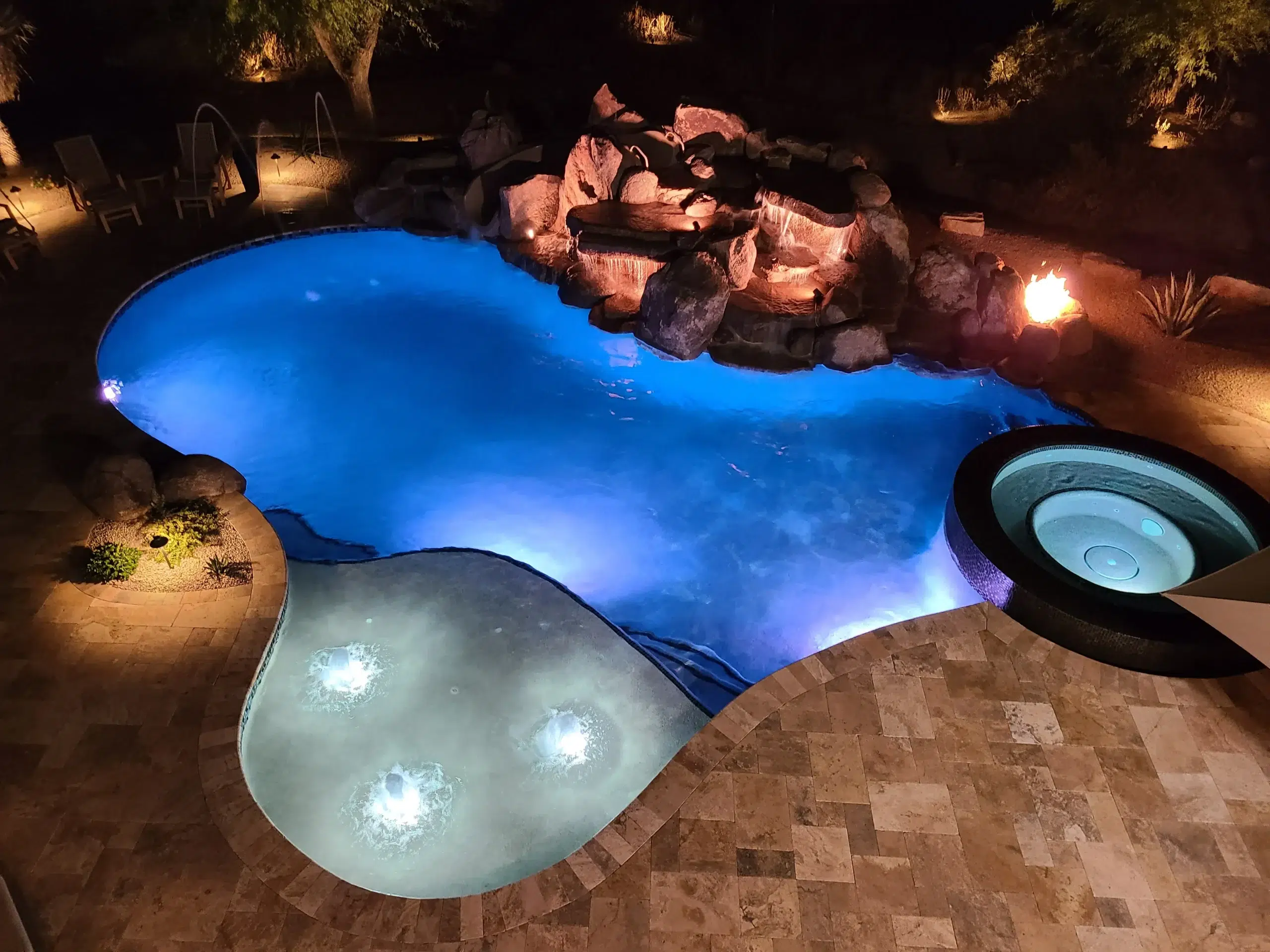 Pool and landscape design by Lone Star Landscaping and Copper Leaf Pools in Scottsdale